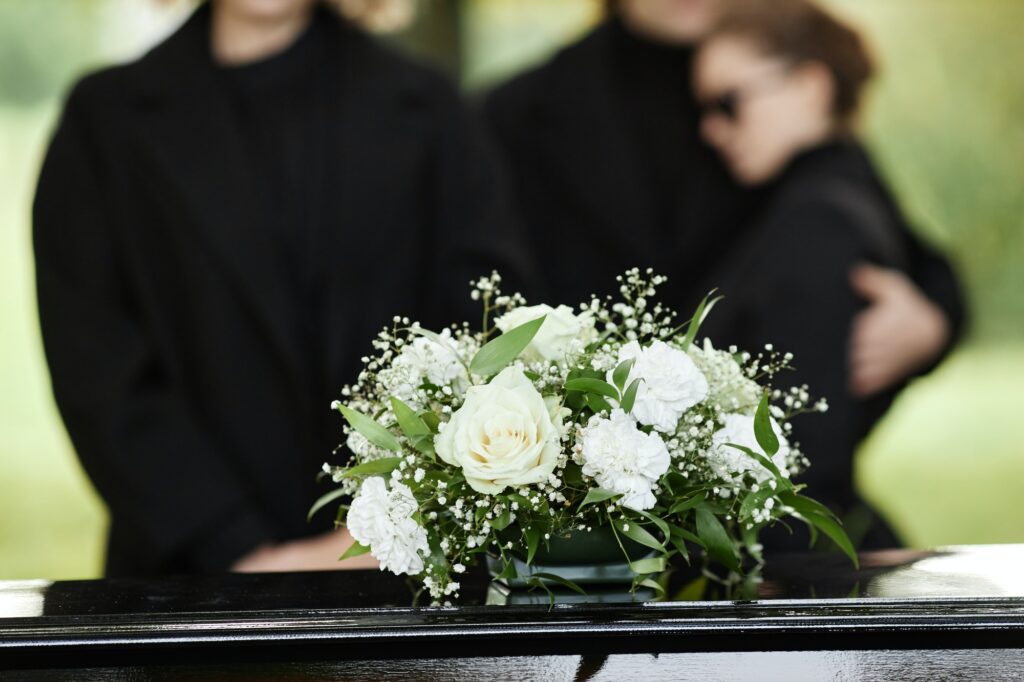 Pet loss owner in the funeral, funeral flowers